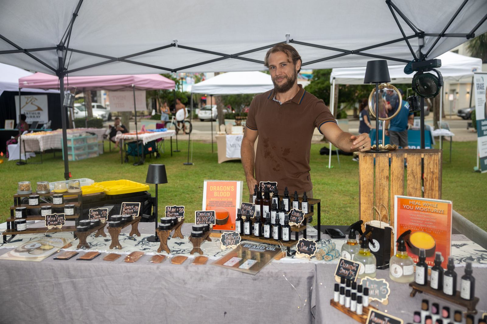 Organic skincare vendor at his booth