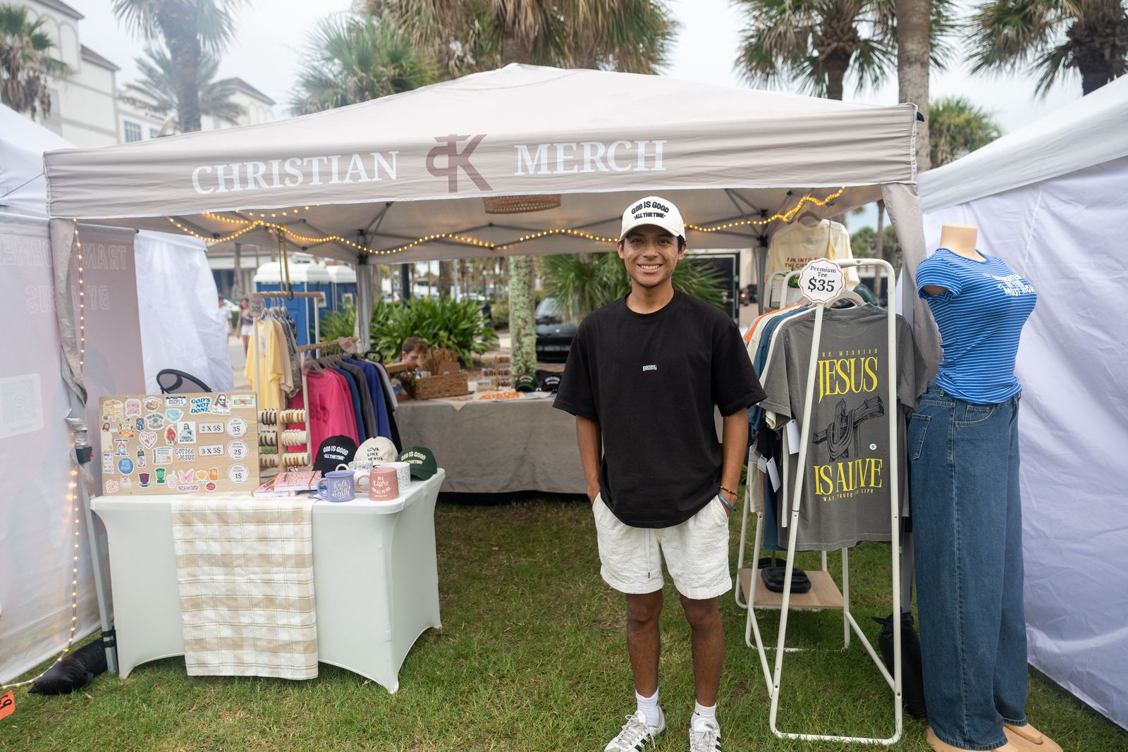 Christian merch vendor at his booth
